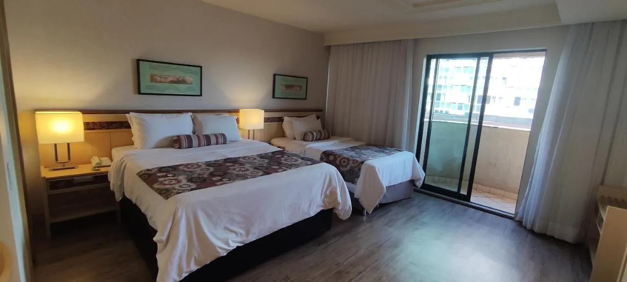 FLAT DE ALTO PADRÃO - ENORME - CENTRO DA CIDADE - 2 Camas - 1 Queen e 1 Solteiro - Arrumação Diária Gratuita - VISTA LINDA - VARANDA - COZINHA Brasília